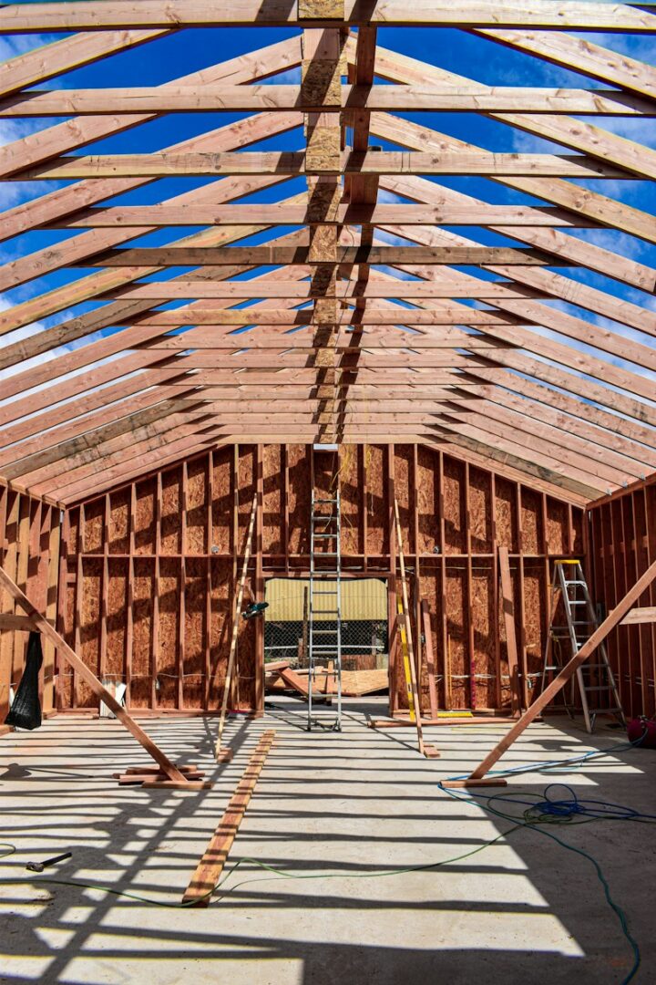 a wooden building with a ladder